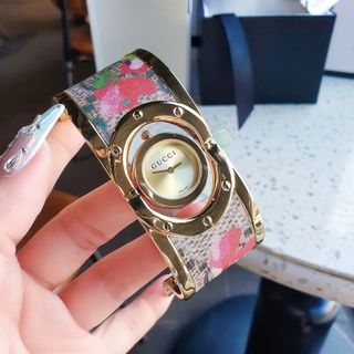 ĐỒNG HỒ NỮ CAO CẤP GUCHI VÒNG BẢNG MẶT XOAY DÂY THÉP BỌC DA