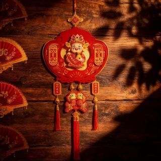 Thần Tài Lắc Thỏi Vàng