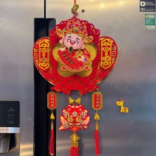 Thần Tài Lắc Thỏi Vàng