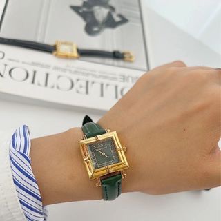 ĐỒNG HỒ NỮ CAO CẤP YXL MẶT VUONG NIỀNG VÀNG DÂY DA XANH FULLBOX