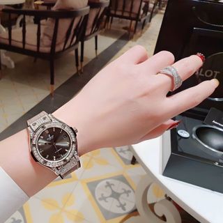 ĐỒNG HỒ COUPLE CAO CẤP HULOT HAI VIỀN HỘT DÂY DA XANH VÀ XÁM MÁY CƠ