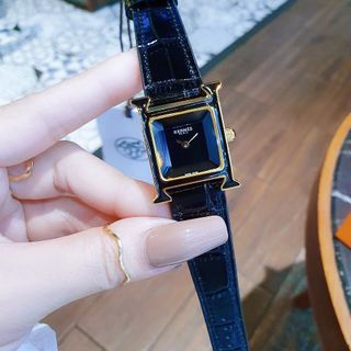 ĐỒNG HỒ NỮ CAO CẤP HERME DÂY DA FULL ĐEN NIỀNG VÀNG MẶT KÍNH KIM CƯƠNG