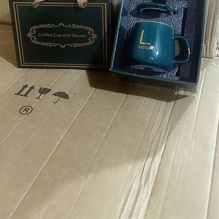 Cốc Sứ kèm Thìa Mẫu Mới Xanh Lucky ( THÙNG 48C)