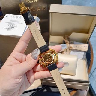 ĐỒNG HỒ NỮ CAO CẤP PVLGARI DÂY DA VIỀN ĐÁ NĂNG LƯỢNG NHIỀU MÀU NIỀNG VÀNG GOLD