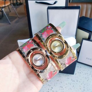 ĐỒNG HỒ NỮ CAO CẤP GUCHI VÒNG BẢNG MẶT XOAY ĐÁY CON ONG DÂY THÉP BỌC DA