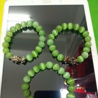 Chuỗi đeo tay đá mắt mèo 10ly mix mặt tỳ hưu nha