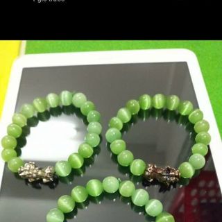 Chuỗi đeo tay đá mắt mèo 10ly mix mặt tỳ hưu nha