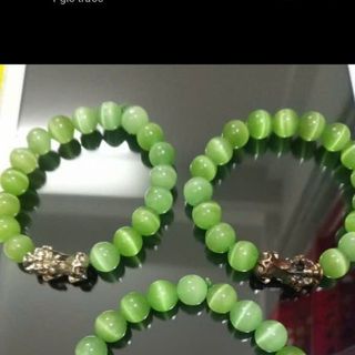 Chuỗi đeo tay đá mắt mèo 10ly mix mặt tỳ hưu nha