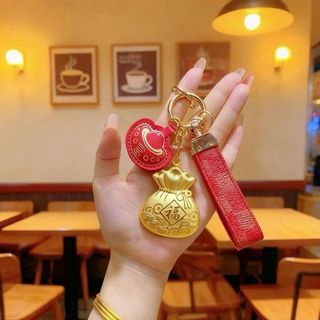 Móc khoá hình túi tiền hottrend 2026