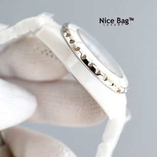 ĐỒNG HỒ NỮ CAO CẤP CHANEU ĐÁ CERAMIC TRẮNG VÀ ĐEN MẶT SỐ HỘT