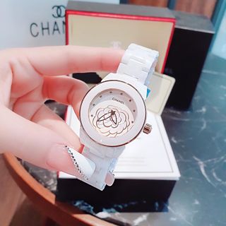 ĐỒNG HỒ NỮ CAO CẤP CHANEU ĐÁ CERAMIC TRẮNG MẶT HOA VIỀN HỒNG VÀ VIỀN BẠC