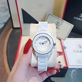 ĐỒNG HỒ NỮ CAO CẤP CHANEU ĐÁ CERAMIC TRẮNG MẶT HOA VIỀN HỒNG VÀ VIỀN BẠC