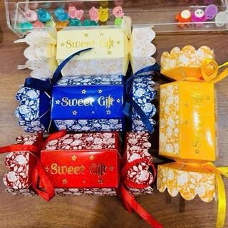 Vỏ giấy hình kẹo đóng quà tết