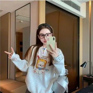 Áo dài tay nữ cổ tròn đính charm nút