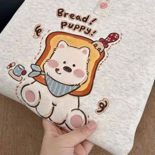 Áo dài tay nữ cổ tròn đính charm nút