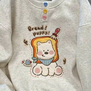 Áo dài tay nữ cổ tròn đính charm nút