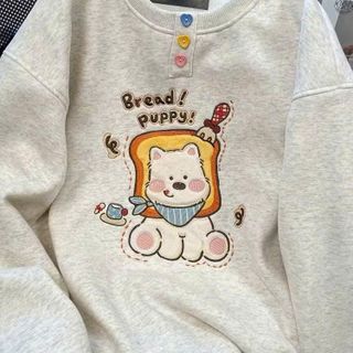 Áo dài tay nữ cổ tròn đính charm nút