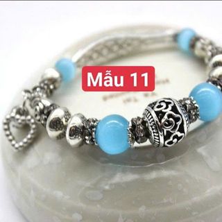 Vòng tay giá sỉ kim loại mix đá mắt mèo