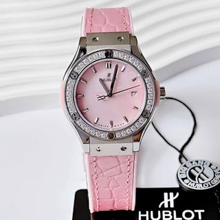 ĐỒNG HỒ NỮ CAO CẤP HULOT MÀU HỒNG XÀ CỪ 1 NIỀNG HỘT DÂY CAO SU BỌC DA