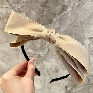 Cài nơ vải gọng đen-lố 12c mix các màu trên 190k/lố 12 (15.8k/c)