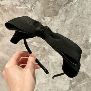 Cài nơ vải gọng đen-lố 12c mix các màu trên 190k/lố 12 (15.8k/c)