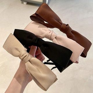 Cài nơ vải gọng đen-lố 12c mix các màu trên 190k/lố 12 (15.8k/c)