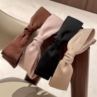 Cài nơ vải gọng đen-lố 12c mix các màu trên 190k/lố 12 (15.8k/c)