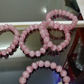 Chuỗi phong thủy đeo tay đá mắt mèo 10 li màu hồng