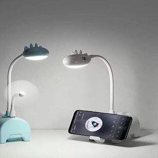 ĐÈN HỌC KHỦNG LONG KIÊM GIÁ ĐỠ, QUẠT, ĐỰNG VIẾT 6IN1