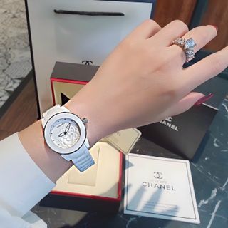 ĐỒNG HỒ NỮ CAO CẤP CHANEU CERAMIC TRẮNG MẶT HOA VIỀN HỒNG VÀ VIỀN BẠC
