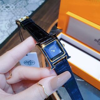 ĐỒNG HỒ NỮ CAO CẤP HERME DÂY DA FULL ĐEN NIỀNG VÀNG MẶT KÍNH CẮT GIÁC