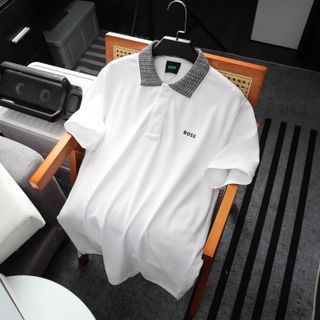 Polo B.O.S.S phối cổ hoạ tiết.  Chất vải cotton cá sấu 2c mềm mịn, logo in cao.