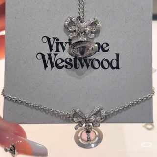 HOA TAI VÀ DÂY CHUYỀN SIÊU CẤP VIVIENN MẶT NƠ ĐÁ FULLBOX