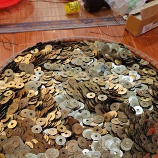 Đồng xu âm dương may mắn