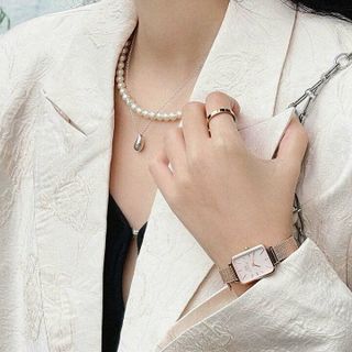 ĐỒNG HỒ NỮ CAO CẤP D WELLINGTON QUARDO ROUGE DÂY LƯỚI MẶT CN HỒNG HỘP NƠ TEM