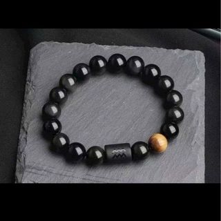 Chuỗi đeo tay đen đá thạch anh 10ly 15k rẻ nee