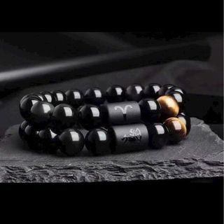 Chuoi deo tay 10ly thach anh. Đen 15k nha