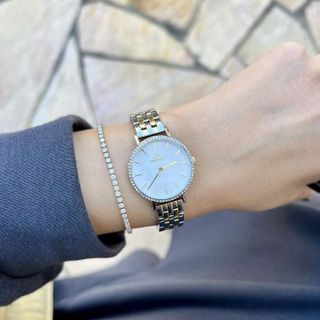 ĐỒNG HỒ NỮ CAO CẤP D WELLINGTON LUMINE DÂY THÉP MẶT TRÒN VIỀN ĐÁ HỘP NƠ TEM