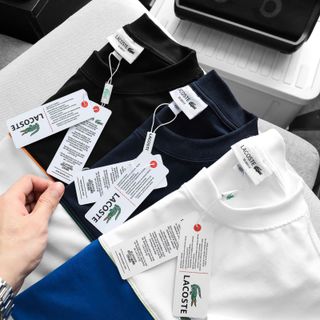 T-shirt LC phối màu.  Chất thun Cotton may phối lé, tay in chữ Logo nổi