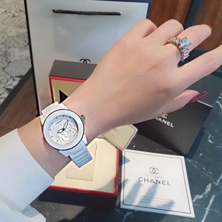 ĐỒNG HỒ NỮ CAO CẤP CHANEU CERAMIC ĐÁ TRẮNG MẶT HOA VIỀN HỒNG VÀ VIỀN BẠC