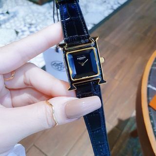 ĐỒNG HỒ NỮ CAO CẤP HERMET DÂY DA FULL ĐEN NIỀNG VÀNG MẶT KÍNH CẮT GIÁC GIÁ MỚI