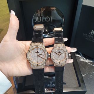 ĐỒNG HỒ CẶP CAO CẤP HULOT MẶT FULL HỘT NIỀNG ĐỒNG