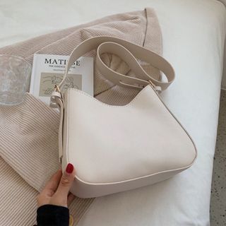 Túi dáng thuyền da 2 ly K47