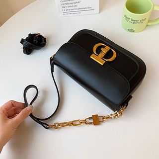 Túi xách nữ, túi đeo chéo dáng bầu khóa T K311