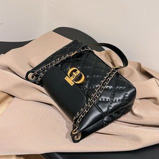 Túi xách nữ, túi đeo chéo chần chỉ tai gập khóa CD K507