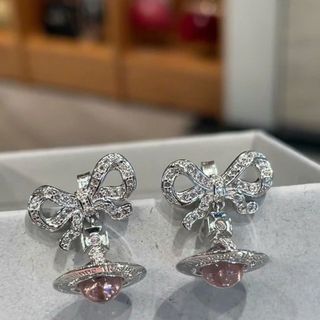 HOA TAI VÀ DÂY CHUYỀN SIÊU CẤP VIVIENN MẶT NƠ ĐÁ FULLBOX TÚI