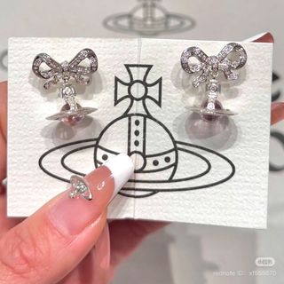 HOA TAI VÀ DÂY CHUYỀN SIÊU CẤP VIVIENN MẶT NƠ ĐÁ FULLBOX TÚI