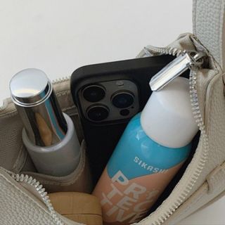 Túi xách nữ kẹp nách đeo chéo dáng thuyền da gạo có dải thắt độc đáo K756