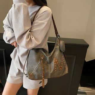 Túi xách nữ kẹp nách đeo chéo kết hợp thành ba lô cá tính phối bò K685