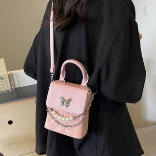 Túi xách nữ kẹp nách đeo chéo đựng điện thoại da nhung dây ngọc gắn mác bươm bạc K644